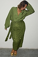 Olive Sequin Jaspre Skirt with a wrap tie waist, olive green shirt and gold heels.