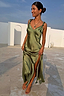 Olive Sofia Dress in olive satin with tie-knot shoulders and side split, designed in London and shown on a model.