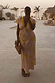 Pink Fawn Poppy Olivia midaxi dress with yellow lace trim and deer print, highlighting inclusive sizing.