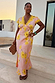 Pink Fawn Poppy Olivia Dress featuring a fawn poppy print and yellow lace trim at the neckline.