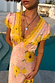 Pink Fawn Poppy Olivia Dress featuring yellow lace trim, short sleeves, and a V-neckline with a floral and deer print.