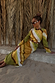 Thumbnail for Green Ombre Alba Dress with a cut-out waist and stone beading in an earthy cotton-linen blend, styled for vacation.