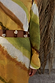 Green Ombre Alba Dress in earthy yellow and green tones with natural stone beading and waist cut-out detail.