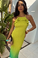 Lime Ombre Plisse Claudia Dress with gold flecks and a frilled neckline, styled for a summer vacation.