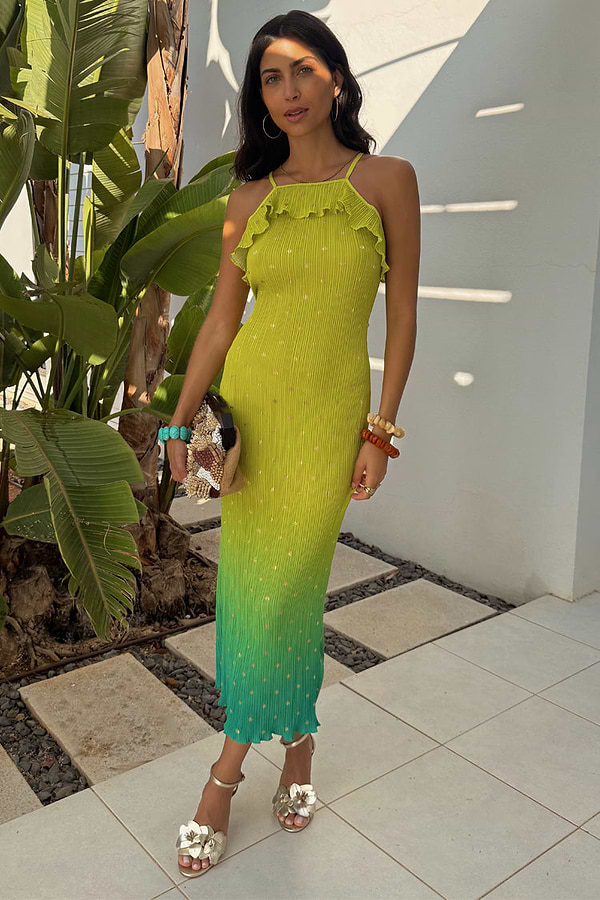 Lime Ombre Plisse Claudia Dress with a frilled neckline and gold flecks, styled for a summer vacation.