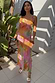 Thumbnail for Multi-coloured Ombre Jacquard Faro Dress with tiered ruffles and silver embellishment on a model for a vacation look.