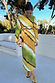 Green Ombre Alba Dress featuring earthy green and yellow tones, long sleeves and natural stone beading.