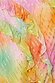 Ombre Jacquard Faro Dress close-up featuring multi-coloured tiered ruffles and textured silver metallic yarn.