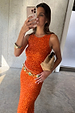 Orange Sequin Tank Top with a racerback, styled with a matching skirt and chunky gold accessories.
