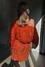 Thumbnail for Orange Sequin Tilly Dress in shimmering burnt orange with an off-the-shoulder silhouette and mini length.