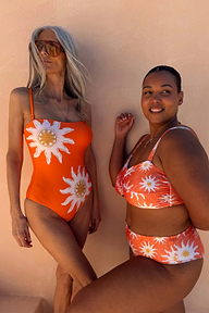 Orange Sun Bandeau Swimsuit with oversized sun motifs and gold embroidery, shown on models for inclusive sizing.