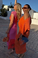 Thumbnail for Orange Tilly Dress with gold flecks and asymmetric shoulder, styled in a sunny vacation setting.