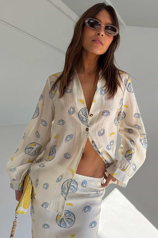 Oyster Miley Shirt in a sheer fine line oyster and lemon print, styled as a co-ord with a matching skirt.