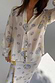 Oyster Miley Shirt with a blue fine line oyster and yellow lemon print in a lightweight, oversized button-up fit.