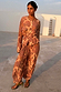 Peach Paisley Anna Top with a tie waist and matching balloon trousers for a coordinated vacation look.