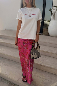 Pink Paisley Dorris Skirt in a relaxed silhouette with a paisley print, styled with a white graphic tee.