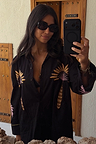 Black Palm Embroidered Shirt with pink palm motifs and whipstitch collar, worn by a model in a mirror selfie.