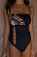 Black bandeau swimsuit featuring palm embroidery and pink whipstitch detailing, designed in London.