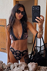 Black Palm Embroidered Triangle Bikini with pink whipstitch and glass bead palm motifs, shown on a model.