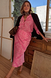 Pink Bandana Dorris Skirt featuring an iconic paisley print in a relaxed midi silhouette, styled on a model.