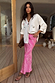 Pink Bandana Dorris Skirt in an iconic paisley print, styled with a white cardigan and animal print accessories.