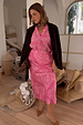 Pink Bandana Dorris Skirt featuring an iconic paisley print, paired with a matching shirt and brown jacket.