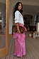 Pink Bandana Dorris Skirt in an iconic paisley print and relaxed silhouette, styled with a leopard clutch.