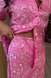 Pink Bandana Dorris Skirt featuring a white paisley print on a bold pink base, styled as a vibrant co-ord set.