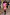 Thumbnail for Pink Bandana Mini Dorris Skirt and matching shirt co-ord styled with a leopard print clutch and tall brown boots.