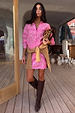 Pink Bandana Mini Dorris Skirt and matching shirt co-ord styled with a leopard print clutch and tall brown boots.