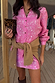 Pink Bandana Mini Dorris Skirt and matching shirt in a paisley print styled with a tan cardigan and leopard clutch.