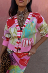 Pink Dallas Cardigan featuring abstract cowboy motifs, a striped button stand and soft-touch knit.