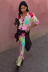 Pink Dallas Cardigan with abstract cowboy motifs and a striped button stand, styled as a matching co-ord set.