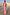 Thumbnail for Pink Daphne Skirt with a high-waisted straight fit, styled as a co-ord for a wedding guest look in a sunny setting.