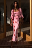 Pink Hearts Cardigan with red embroidery and contrast trims, layered over a matching tank and skirt with a leopard clutch.