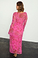Pink Paisley Mesh Midaxi Dress with long sleeves in a sheer fabric, shown from the back.