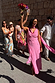 Pink Sophie Dress with shimmering gold flecks and a multi-wear scarf, styled for a celebratory wedding guest look.