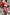 Thumbnail for Pink paisley Splice Bandana Cardigan with leopard print trims and red sleeves, styled tied around the waist.