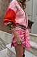 Pink paisley Splice Bandana Cardigan with leopard print trims and red sleeves, styled tied around the waist.