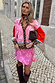 Splice Bandana Cardigan in pink paisley and leopard print, styled with a matching mini skirt and brown knee-high boots.