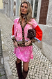 Splice Bandana Cardigan in pink paisley and leopard print, styled with a matching mini skirt and brown knee-high boots.