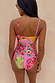 Pink Fruit Stamps Bandeau Swimsuit with a colourful fruit print and slim adjustable straps, shown from the back.