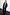 Thumbnail for Navy Pinstripe Taylor Blazer with iconic embroidered motifs, matching Arden Trousers and leopard print shoes.