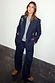 Navy Pinstripe Taylor Blazer with iconic embroidered motifs, matching Arden Trousers and leopard print shoes.