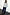 Thumbnail for Navy Pinstripe Arden Trousers styled with a grey knit jumper and leopard print shoes for a London look.