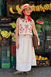 Cream cotton Pollenca Top with red palm tree embroidery and scallop hem, styled as a co-ord at a fruit market stall.