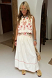 Cream Pollenca cotton skirt co-ord with red embroidered palm trees and contrast blanket stitching.