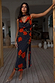 Black Poppy Sophie Dress in red poppy and polka dot print with cowl neck and multi-wear detachable scarf.