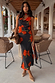 Black Sophie Dress featuring a red poppy and polka dot print, cowl neck and multi-wear detachable scarf.
