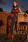 Black Poppy Sophie Dress with red poppies and white polka dots, featuring a multi-wear detachable scarf.